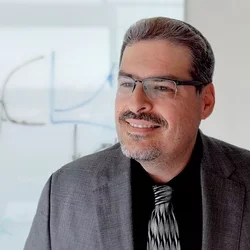 Tamir Gonen in front of whiteboard